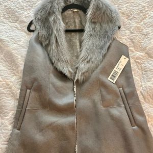 Stylish gray, fir collar vest - can dress it up or casual cool look with jeans